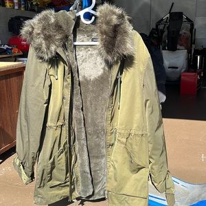 Brand new coat with inside fur lining